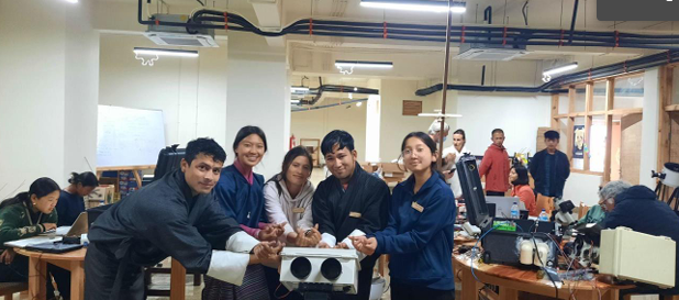 Figure 1: Mentoring the class XI students working on PANOPTES camera box